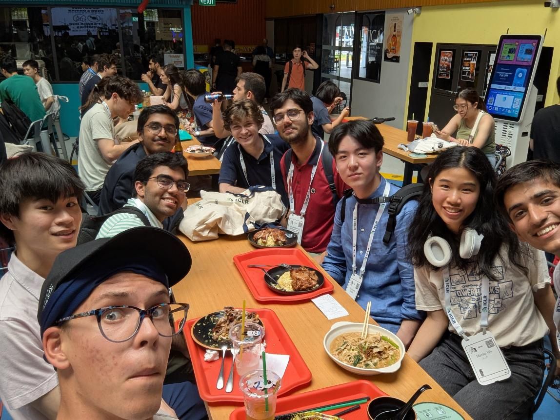 Undergraduate researchers sharing a meal at the ICLR 2025 meet up.