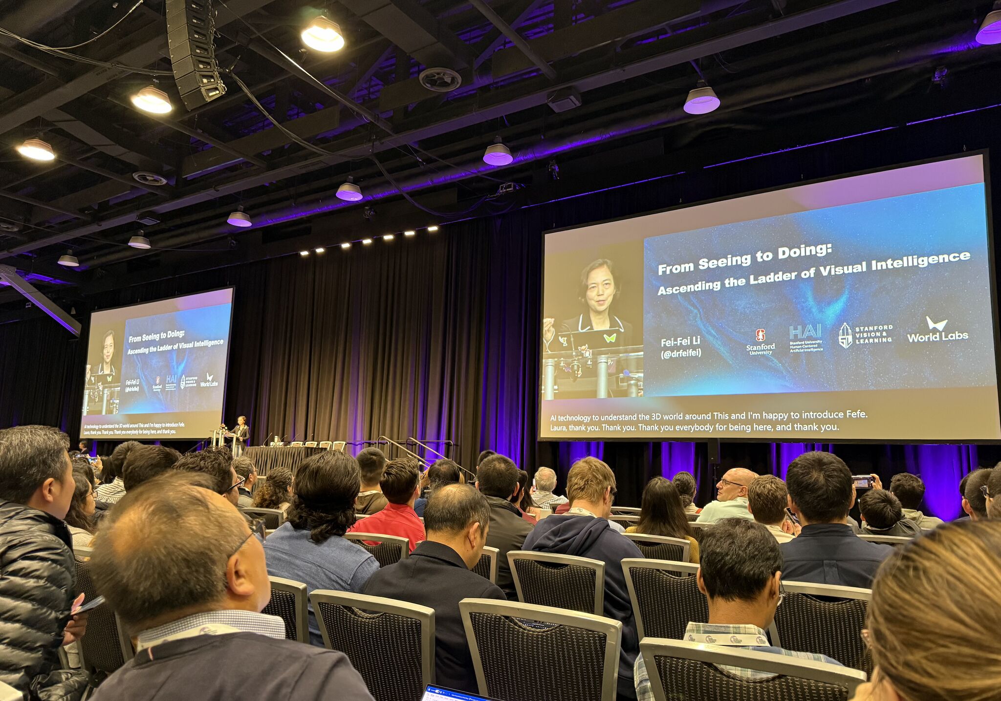 Attendees listening to Fei-Fei Li’s invited talk on visual intelligence at NeurIPS 2024.