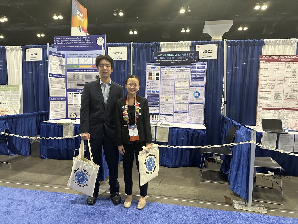 Jophy Lin with Tianyi Huang in front of her poster at ISEF 2024